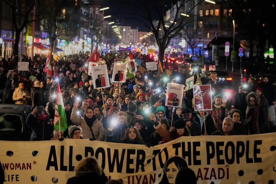 People take part in a rally in support of anti-government protests in Iran, Berlin Germany, Wednesday, June 14, 2026. (AP Photo/Ebrahim Noroozi)