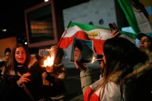 Demonstrators burn a poster depicting Iran’s Supreme Leader Ayatollah Ali Khamenei during a rally in support of anti-government protests in Iran, in Holon, Israel Wednesday, Jan. 14, 2026. (AP Photo/Ohad Zwigenberg) Demonstrators burn a poster depicting Iran’s Supreme Leader Ayatollah Ali Khamenei during a rally in support of anti-government protests in Iran, in Holon, Israel Wednesday, Jan. 14, 2026. (AP Photo/Ohad Zwigenberg)