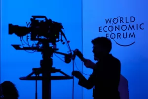 A camera man is seen on the final day of the Annual Meeting of the World Economic Forum in Davos, Switzerland, Friday, Jan. 23, 2026. (AP Photo/Markus Schreiber) A camera man is seen on the final day of the Annual Meeting of the World Economic Forum in Davos, Switzerland, Friday, Jan. 23, 2026. (AP Photo/Markus Schreiber)