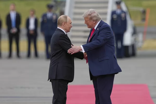 President Donald Trump greets Russia’s President Vladimir Putin Friday, Aug. 15, 2025, at Joint Base Elmendorf-Richardson, Alaska. (AP Photo/Julia Demaree Nikhinson)