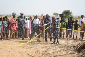 Nigeria police, Anti-Bomb squad, secure the scene of a U.S. airstrike in Northwest, Jabo, Nigeria, Friday, Dec. 26, 2025. (AP Photo/ Tunde Omolehin)