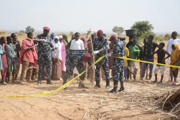 Nigeria police, Anti-Bomb squad, secure the scene of a U.S. airstrike in Northwest, Jabo, Nigeria, Friday, Dec. 26, 2025. (AP Photo/ Tunde Omolehin)