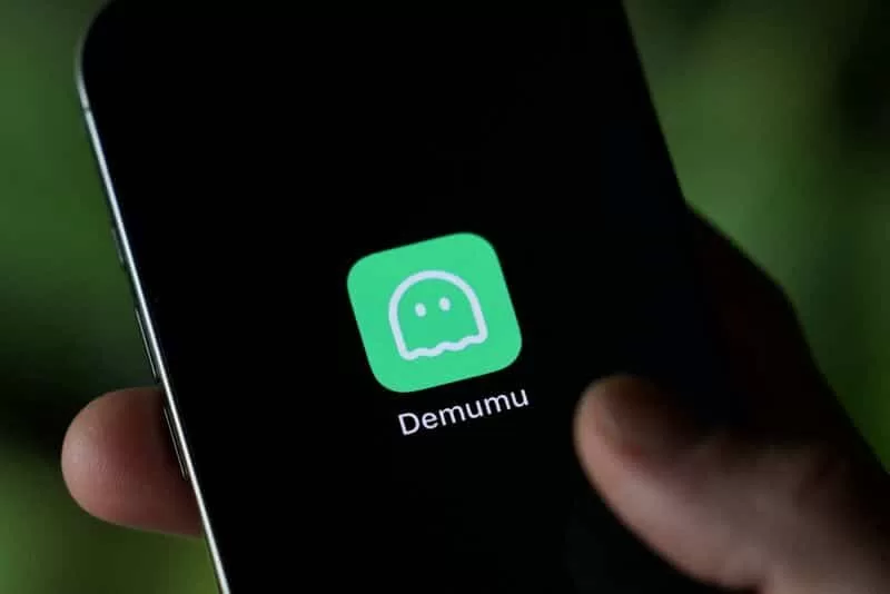A logo of “Are you dead” app, or “Demumu” in its english version, a Chinese safety tool designed for people living alone, appears on a mobile phone in this illustration picture taken January 14, 2026. REUTERS/Tingshu Wang/Illustration