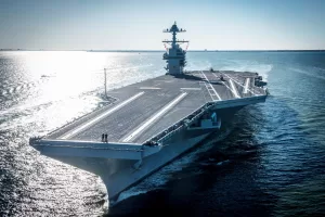 FILE – In this photo provided by the U.S. Navy, the USS Gerald R. Ford embarked on the first of its sea trials to test various state-of-the-art systems on its own power for the first time, April 8, 2017, from Newport News, Va. (Mass Communication Specialist 2nd Class Ridge Leoni/U.S. Navy via AP, File) FILE – In this photo provided by the U.S. Navy, the USS Gerald R. Ford embarked on the first of its sea trials to test various state-of-the-art systems on its own power for the first time, April 8, 2017, from Newport News, Va. (Mass Communication Specialist 2nd Class Ridge Leoni/U.S. Navy via AP, File)