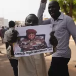 FILE – Nigeriens participate in a march called by supporters of coup leader Gen. Abdourahmane Tchiani, pictured, in Niamey, Niger, July 30, 2023. (AP Photo/Sam Mednick, File) 


Associated Press / LaPresse
Only italy and spain