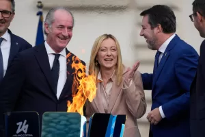 Italy’s Prime Minister Giorgia Meloni, center is flanked by Veneto region President Luca Zaia, left, and vice president of Italy’s Council of Ministers Matteo Salvini attend the Milan Cortina 2026 Winter Olympics cauldron lighting, in front of the Quirinale Presidential Palace, in Rome, Friday Dec. 5, 2025. (AP Photo/Gregorio Borgia)





Associate Press/ LaPresse
Only Italy and Spain