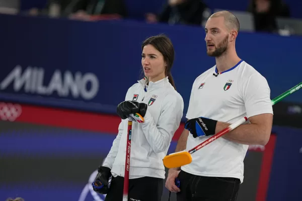 Italy’s Stefania Constantini and Amos Mosaner competes against Britain during the bronze medal mixed doubles curling match, at the 2026 Winter Olympics, in Cortina D’Ampezzo, Italy, Tuesday, Feb. 10, 2026. (AP Photo/Fatima Shbair) 


Associatesd Press / LaPresse
Only italy and spain