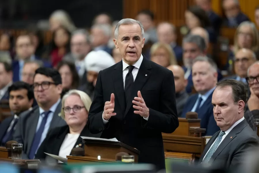 Prime Minister Mark Carney speaks in the House of Commons in Ottawa, on Wednesday, Feb. 11, 2026. (Adrian Wyld/The Canadian Press via AP)