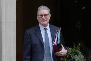 Britain’s Prime Minister Keir Starmer leaves 10 Downing Street to attend the weekly Prime Ministers’ Questions session in parliament in London, Wednesday, Feb. 25, 2026. (AP Photo/Kin Cheung)