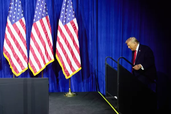 President Donald Trump arrives to speak to House Republican lawmakers during their annual policy retreat, Tuesday, Jan. 6, 2026, in Washington. (AP Photo/Evan Vucci)