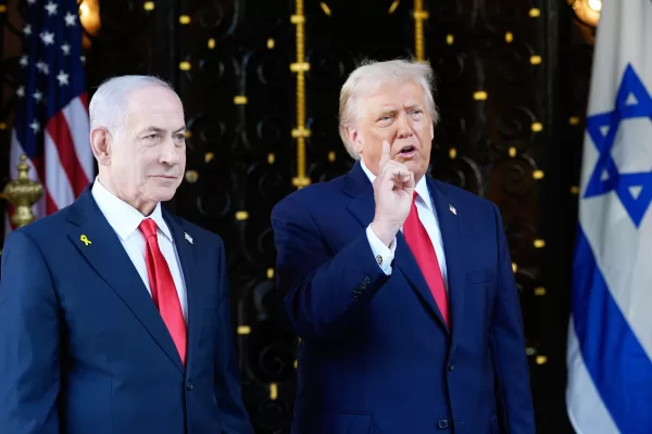 President Donald Trump speaks to reporters as he greets Israel’s Prime Minister Benjamin Netanyahu at his Mar-a-Lago club, Monday, Dec. 29, 2025, in Palm Beach, Fla. (AP Photo/Alex Brandon)