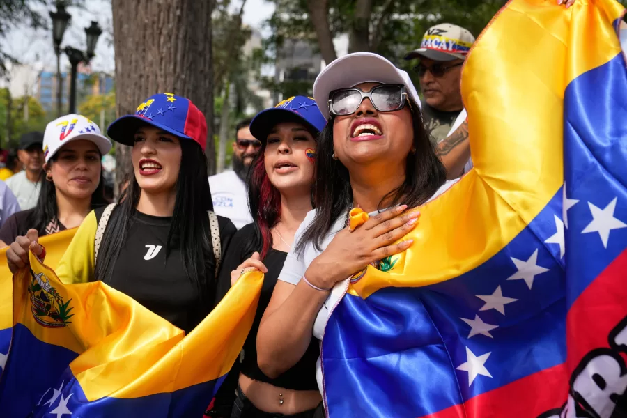 FILE – Venezuelan nationals celebrate after U.S. President Donald Trump announced that President Nicolas Maduro had been captured and flown out of Venezuela, in Lima, Peru, Jan. 3, 2026. (AP Photo/Martin Mejia, File)
