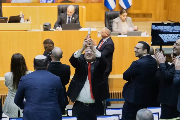 Israel’s Minister of National Security, Itamar Ben-Gvir, center, and lawmakers celebrate after Israel’s parliament passed a law approving the death penalty for Palestinians convicted of murdering Israelis, at the Knesset in Jerusalem Monday, March 30, 2026. (AP Photo/Itay Cohen)