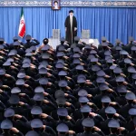 FILE –  In this photo released by an official website of the Office of the Iranian Supreme Leader, Supreme Leader Ayatollah Ali Khamenei stands as the army’s air force and air defense staff salute in Tehran, Iran, Feb. 8, 2020. A portrait of the late revolutionary founder Ayatollah Khomeini hangs in the background. (Office of the Iranian Supreme Leader via AP, File)