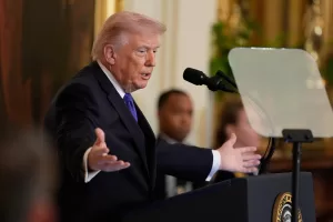 President Donald Trump speaking before participating in a Medal of Honor ceremony in the East Room of the White House, Monday, March 2, 2026, in Washington. (AP Photo/Mark Schiefelbein)