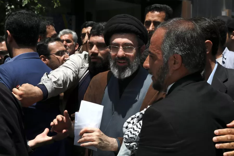 FILE – Mojtaba Khamenei, the son of Iranian Supreme Leader Ayatollah Ali Khamenei, center, attends the annual Quds, or Jerusalem Day rally in Tehran, Iran, on May 31, 2019. (AP Photo/Vahid Salemi, File)
