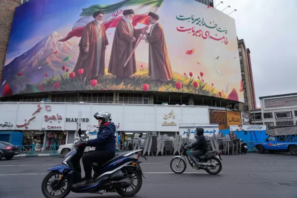 Motorbikes drive past a billboard depicting Irans late Supreme Leader Ayatollah Ali Khamenei, center, handing the countrys flag to his son and successor Ayatollah Mojtaba Khamenei, right, as the late revolutionary founder Ayatollah Ruhollah Khomeini stands at left, in a square in downtown Tehran, Iran, Tuesday, March 10, 2026. (AP Photo/Vahid Salemi) 


Associated Press. / LaPresse
Only italy and spain