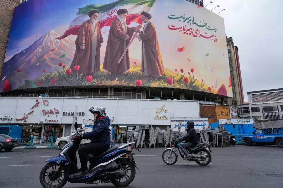 Motorbikes drive past a billboard depicting Irans late Supreme Leader Ayatollah Ali Khamenei, center, handing the countrys flag to his son and successor Ayatollah Mojtaba Khamenei, right, as the late revolutionary founder Ayatollah Ruhollah Khomeini stands at left, in a square in downtown Tehran, Iran, Tuesday, March 10, 2026. (AP Photo/Vahid Salemi) 


Associated Press. / LaPresse
Only italy and spain