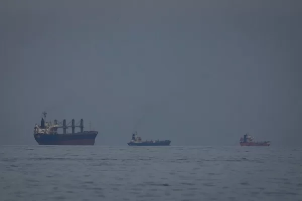Oil tankers and ships line up in the Strait of Hormuz as seen from Khor Fakkan, United Arab Emirates, Wednesday, March 11, 2026. (AP Photo/Altaf Qadri)