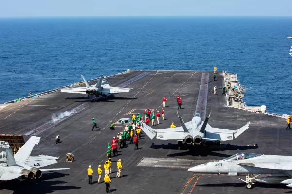 This image provided by U.S. Central Command shows a F/A-18E Super Hornet launching at left, as an F/A-18E Super at right, prepares to launch from the flight deck of Nimitz-class aircraft carrier USS Abraham Lincoln (CVN 72) in support of Operation Epic Fury, on Saturday, Feb. 28, 2026. (U.S. Navy via AP)