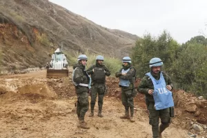 FILE – UNIFIL peacekeepers secure the area in Khardali, southern Lebanon, following a ceasefire between Israel and Hezbollah, Nov. 27, 2024. (AP Photo/Mohammed Zaatari, File)