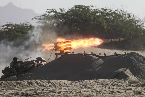 This photo released by the semi-official Fars News Agency shows Iranian troops participating in a military drill near the strategic Strait of Hormuz, Iran, Thursday, Sept. 10, 2020. Units from the navy, air force and ground forces are participating in a nearly 2 million-square-kilometer (772,200-square-mile) area of the Gulf of Oman. (Mehdi Marizad/Fars News Agency via AP)