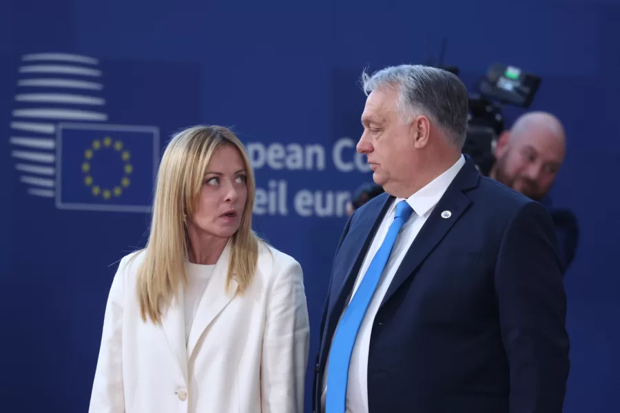 Italy’s Prime Minister Giorgia Meloni, left, speaks with Hungary’s Prime Minister Viktor Orban prior to a group photo of leaders at the EU summit in Brussels, Thursday, March 19, 2026. (AP Photo/Omar Havana)