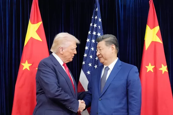 President Donald Trump, left, and Chinese President Xi Jinping, right, shake hands before their meeting at Gimhae International Airport in Busan, South Korea, Thursday, Oct. 30, 2025. (AP Photo/Mark Schiefelbein) President Donald Trump, left, and Chinese President Xi Jinping, right, shake hands before their meeting at Gimhae International Airport in Busan, South Korea, Thursday, Oct. 30, 2025. (AP Photo/Mark Schiefelbein)