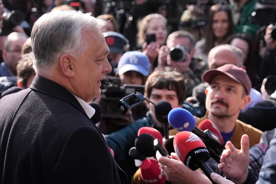 Hungary’s Prime Minister Viktor Orban addresses the media outside a polling station after voting in Budapest, Hungary, Sunday, April 12, 2026. (AP Photo/Petr David Josek)