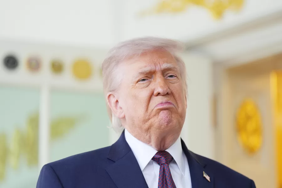 President Donald Trump speaks outside the Oval Office of the White House, Monday, April 13, 2026, in Washington. (AP Photo/Alex Brandon)