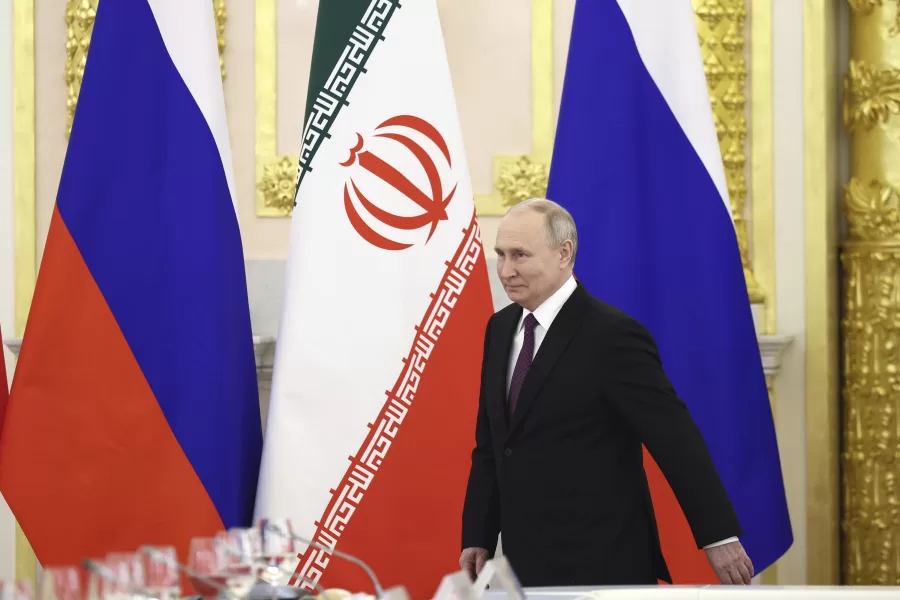 Russian President Vladimir Putin arrives to attend talks with Iranian President Ebrahim Raisi at the Kremlin in Moscow, Russia, Thursday, Dec. 7, 2023. (Sergei Bobylev, Sputnik, Kremlin Pool Photo via AP)