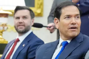 Vice President JD Vance, left, and Secretary of State Marco Rubio attend a meeting in the Oval Office at the White House, March 3, 2026, in Washington. (AP Photo/Mark Schiefelbein, file)