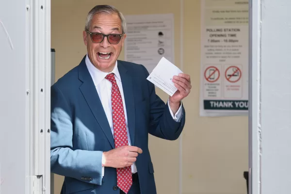 Britain’s Reform Party leader Nigel Farage poses for photographers with his poll card at a polling station in Walton on the Naze, England, Thursday, May 7, 2026 before he casts his vote in the local elections.(AP Photo/Richard Pelham)





Associate Press/ LaPresse
Only Italy and Spain
