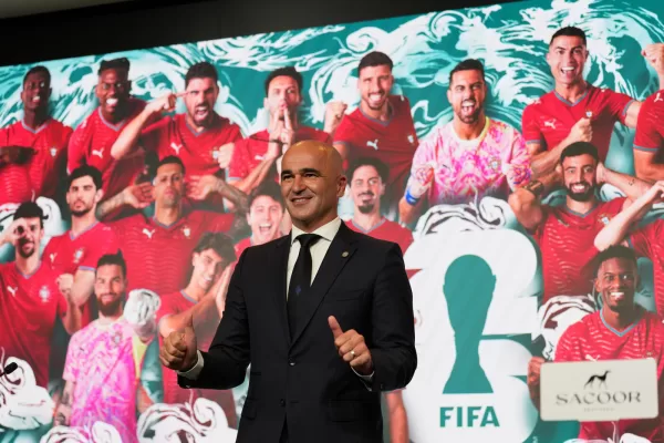Portugal’s head coach Roberto Martinez poses with a picture of the squad that he announced for the 2026 World Cup, in Oeiras, outside Lisbon, Tuesday, May 19, 2026. (AP Photo/Armando Franca) Portugal’s head coach Roberto Martinez poses with a picture of the squad that he announced for the 2026 World Cup, in Oeiras, outside Lisbon, Tuesday, May 19, 2026. (AP Photo/Armando Franca)