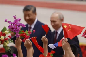 Children wave flags and flowers as Russian President Vladimir Putin, right, and Chinese President Xi Jinping attend a welcoming ceremony at the Great Hall of the People in Beijing Wednesday, May 20, 2026. (Maxim Shemetov/Pool Photo via AP) Children wave flags and flowers as Russian President Vladimir Putin, right, and Chinese President Xi Jinping attend a welcoming ceremony at the Great Hall of the People in Beijing Wednesday, May 20, 2026. (Maxim Shemetov/Pool Photo via AP)
