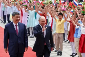 Russian President Vladimir Putin, center, and Chinese President Xi Jinping attend a welcome ceremony at the Great Hall of the People, in Beijing, China, on Wednesday, May 20, 2026. (Alexander Kazakov, Sputnik, Kremlin Pool Photo via AP) Russian President Vladimir Putin, center, and Chinese President Xi Jinping attend a welcome ceremony at the Great Hall of the People, in Beijing, China, on Wednesday, May 20, 2026. (Alexander Kazakov, Sputnik, Kremlin Pool Photo via AP)