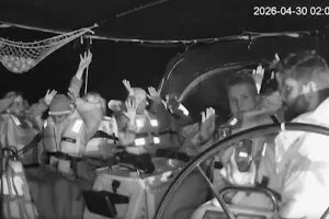 This grab from black and white CCTV footage shows members on flotilla boat with hands in air as Israeli forces intercepted activists who set sail earlier this month from Barcelona attempting to break Israel’s maritime blockade of Gaza, near the southern Greek island of Crete, early Thursday, April 30, 2026. (Global Sumud Flotilla via AP)
Associated Press / LaPresse
Only italy and spain This grab from black and white CCTV footage shows members on flotilla boat with hands in air as Israeli forces intercepted activists who set sail earlier this month from Barcelona attempting to break Israel’s maritime blockade of Gaza, near the southern Greek island of Crete, early Thursday, April 30, 2026. (Global Sumud Flotilla via AP)
Associated Press / LaPresse
Only italy and spain