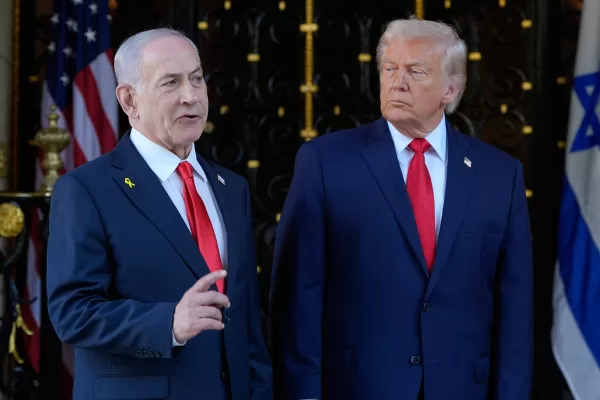 President Donald Trump listens as Israel’s Prime Minister Benjamin Netanyahu speaks during an arrival at his Mar-a-Lago club, Monday, Dec. 29, 2025, in Palm Beach, Fla. (AP Photo/Alex Brandon)