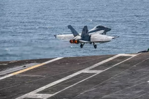 This image provided by U.S. Central Command shows a F/A-18E Super Hornet launching from the USS Abraham Lincoln (CVN 72) for a mission in support of Operation Epic Fury, on Saturday, Feb. 28, 2026. (U.S. Navy via AP)