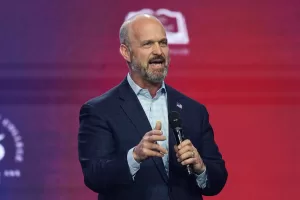 Kevin Roberts, president of The Heritage Foundation, speaks during Turning Point USA’s AmericaFest 2025, Friday, Dec. 19, 2025, in Phoenix. (AP Photo/Ross D. Franklin)
