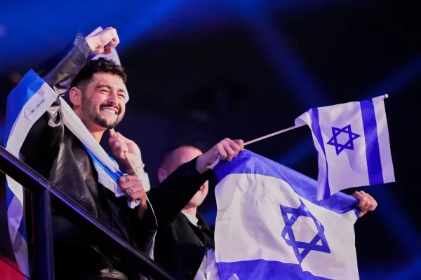 Noam Bettan from Israel performs the song “Michelle” reacts to the vote totals being announced during the first semifinal of the 70th Eurovision Song Contest in Vienna, Austria, Tuesday, May 12, 2026. (AP Photo/Martin Meissner)