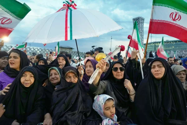 A group of women attend a mass wedding ceremony for couples participating in the “Janfada” (“Sacrifice for Iran”) pro-government campaign in Tehran, Iran, Monday, May 18, 2026. (AP Photo/Vahid Salemi)