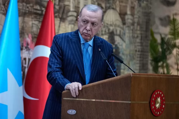 Turkey’s President Recep Tayyip Erdogan listens as Somalia’s President Hassan Sheikh Mohamud speaks during a joint news conference in Istanbul, Turkey, Tuesday, Dec. 30, 2025. (AP Photo/Khalil Hamra)
