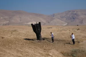 People take photos of the wreckage of an Iranian missile that landed near the West Bank city of Jericho Monday, June 8, 2026. (AP Photo/Mahmoud Illean) People take photos of the wreckage of an Iranian missile that landed near the West Bank city of Jericho Monday, June 8, 2026. (AP Photo/Mahmoud Illean)