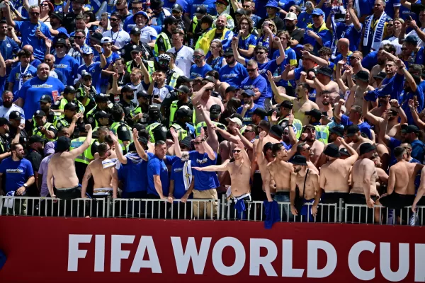 Toronto Police officers interact with Bosnia fans in the stands before the World Cup Group B soccer match between Canada and Bosnia, Friday, June 12, 2026, in Toronto. (Sammy Kogan/The Canadian Press via AP) Toronto Police officers interact with Bosnia fans in the stands before the World Cup Group B soccer match between Canada and Bosnia, Friday, June 12, 2026, in Toronto. (Sammy Kogan/The Canadian Press via AP)