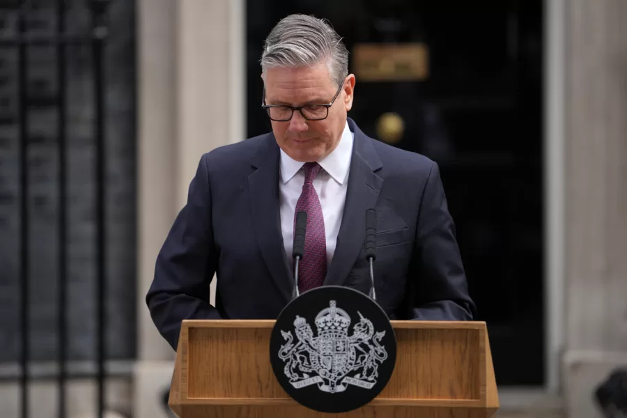 Britain’s Prime Minister Keir Starmer speaks to the media outside 10 Downing Street to announce his resignation in London, Monday, June 22, 2026.(AP Photo/Kin Cheung)