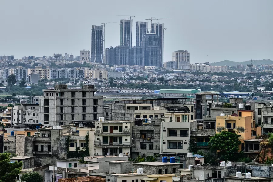 High-rise buildings under construction are seen on the outskirts of Islamabad, Pakistan, Friday, June 12, 2026. (AP Photo/Anjum Naveed)