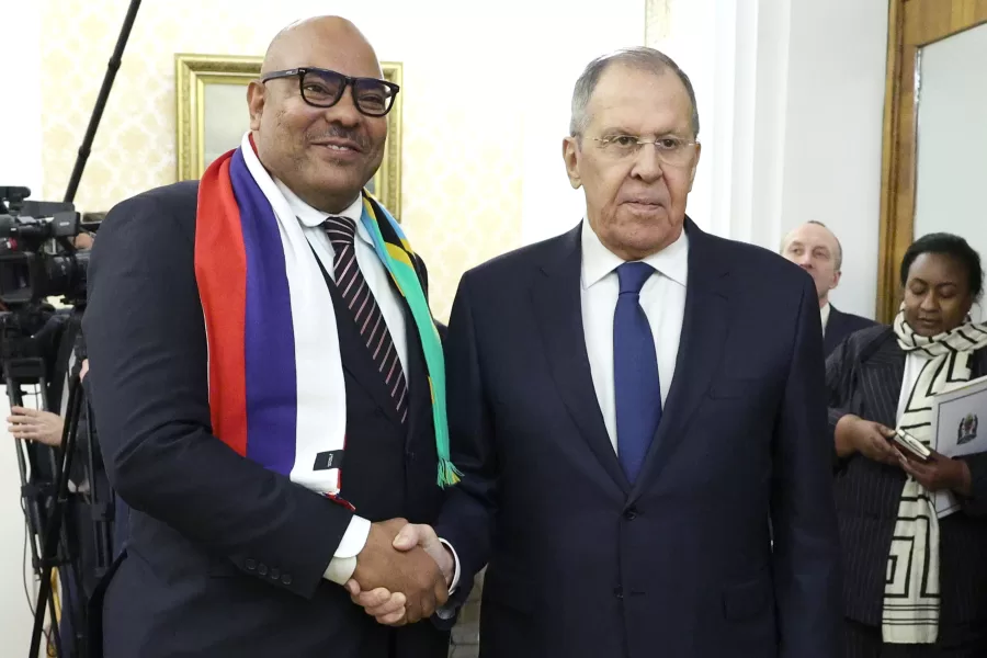 Russian Foreign Minister Sergey Lavrov, right, and Minister of Foreign Affairs and East African Cooperation of Tanzania Mahmoud Thabit Kombo pose for a photo prior to their talks at the Russian Foreign Ministry headquarters in Moscow, Monday, Feb. 9, 2026. (Ramil Sitdikov/Pool Photo via AP)