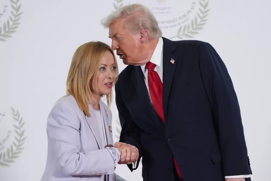 FILE -President Donald Trump greets Italy’s Prime Minister Giorgia Meloni during summit to support ending the more than two-year Israel-Hamas war in Gaza after a breakthrough ceasefire deal, Oct. 13, 2025, in Sharm El Sheikh, Egypt. (AP Photo/Evan Vucci, Pool, File)