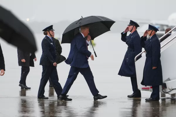 President Donald Trump prepares to board Air Force One, Tuesday, June 23, 2026, at Joint Base Andrews, Md. (AP Photo/Julia Demaree Nikhinson)